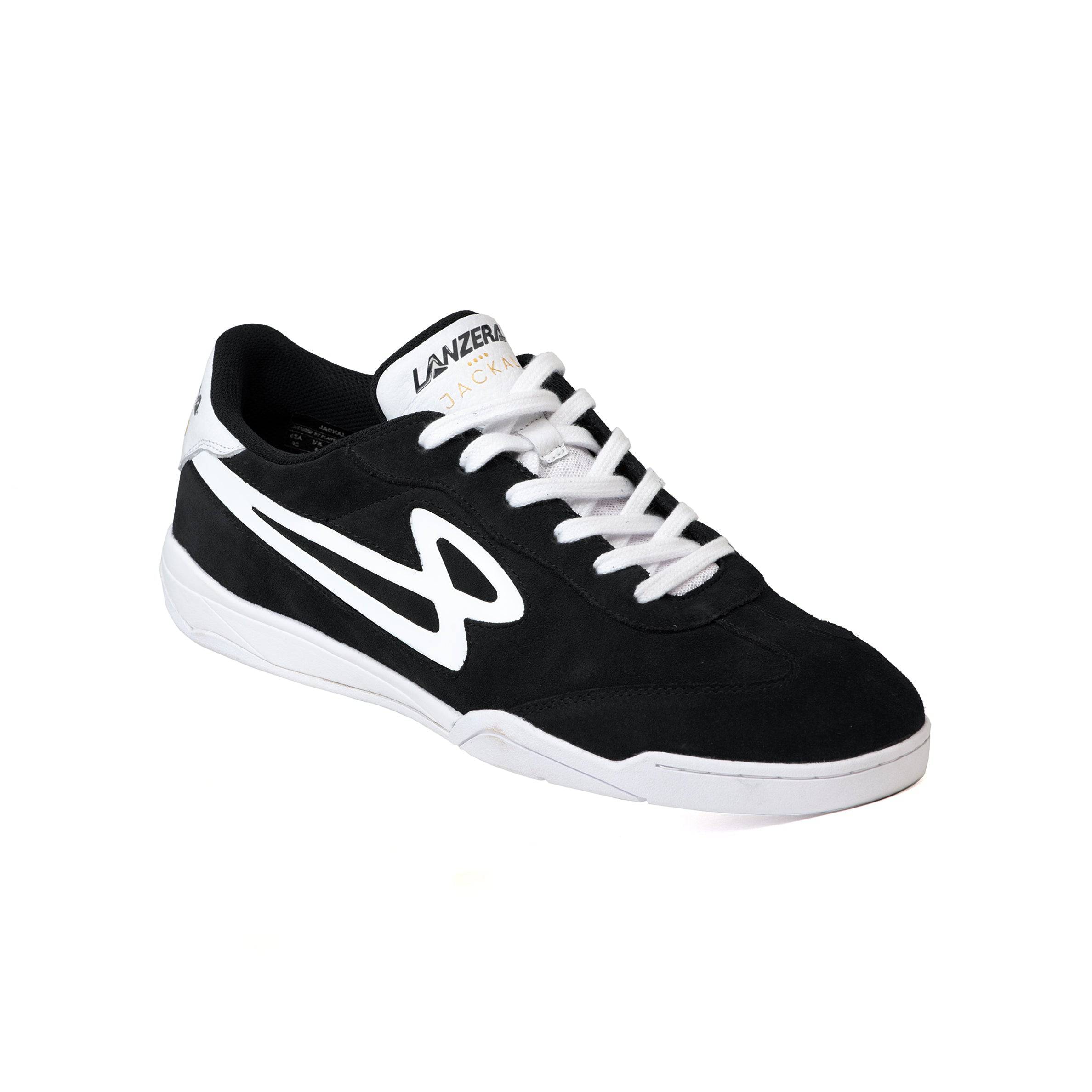 Angled view of Lanzera Jackal Black indoor soccer shoe with suede upper and white sole.