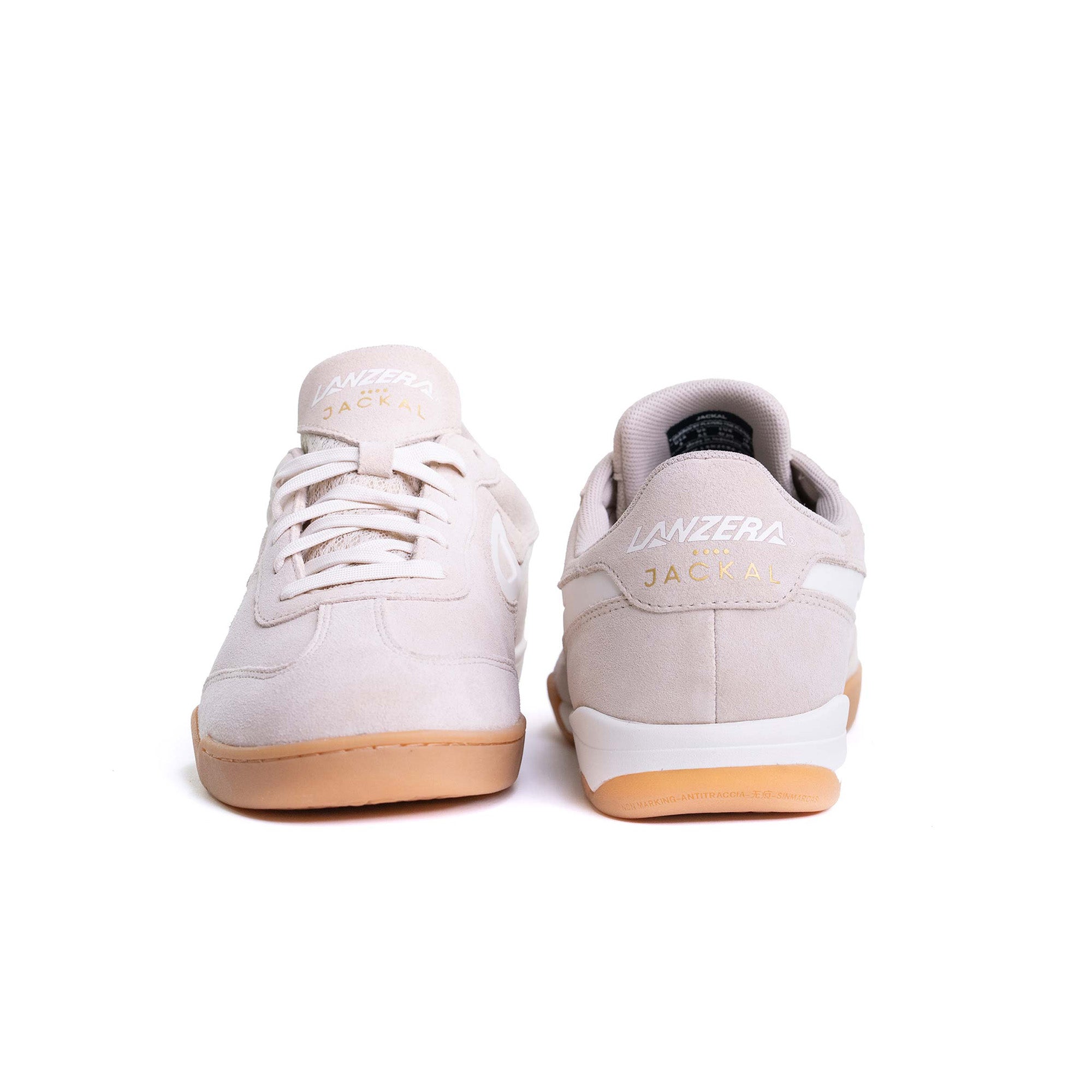 Pair of Lanzera Jackal Crema suede leather sneakers displayed together on a white background, highlighting the warm neutral color and minimal design.