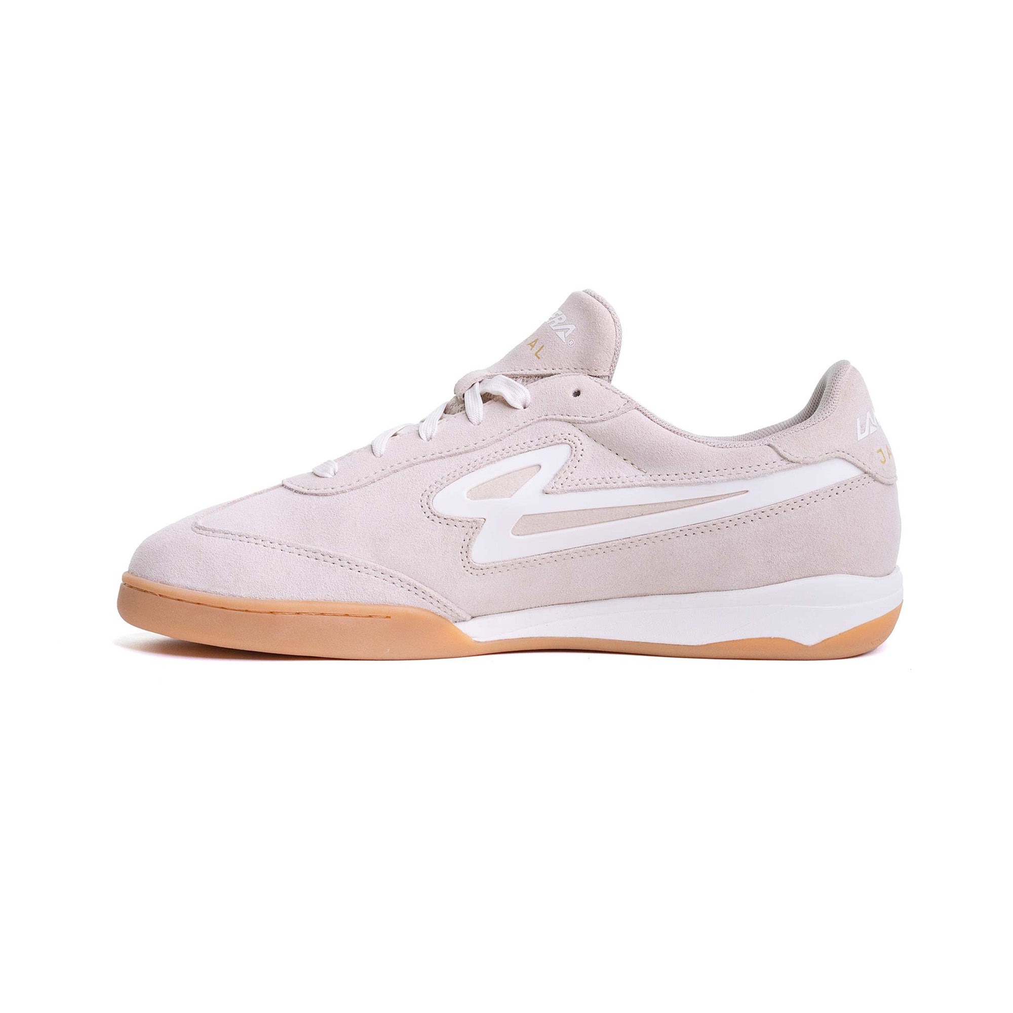 Lanzera Jackal Crema suede leather sneaker shown from the inner side profile, emphasizing smooth stitching and contrast gum outsole.