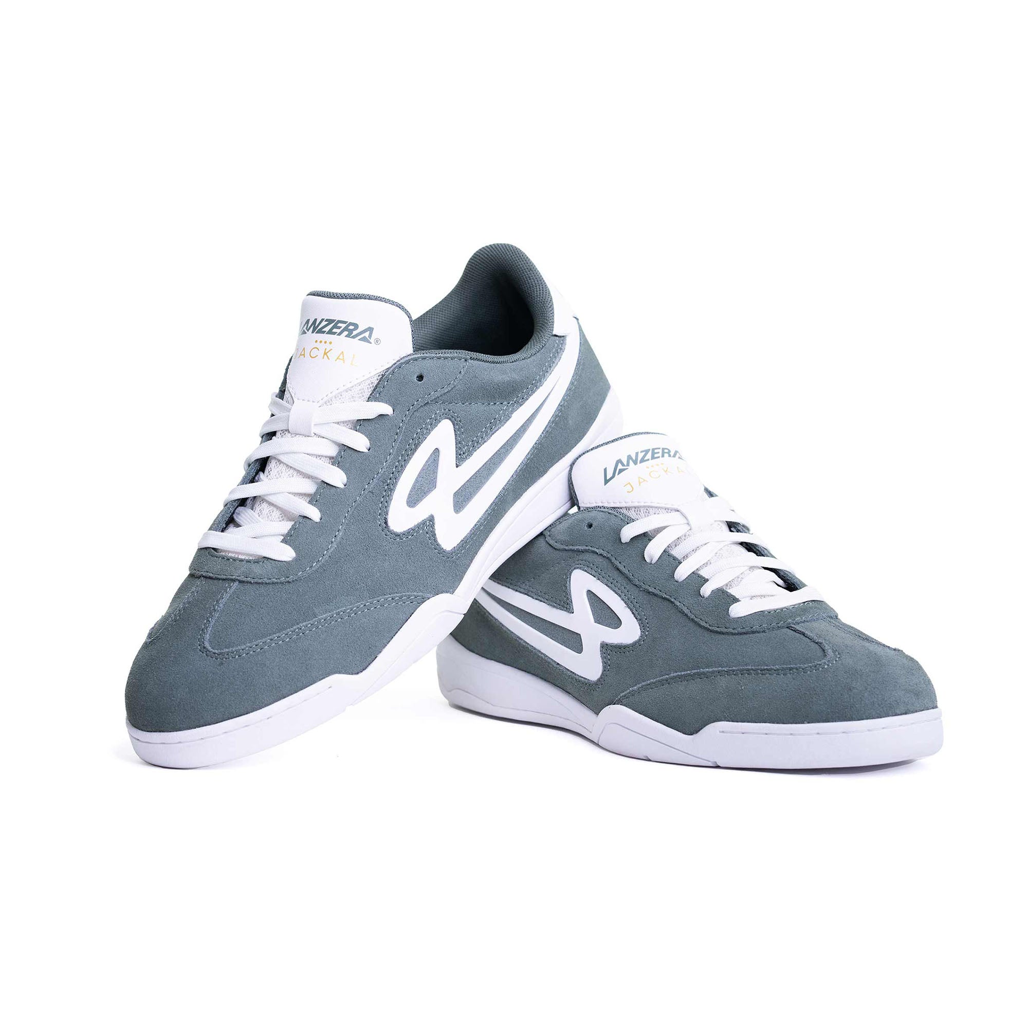Pair of Lanzera Jackal sneakers in Sage green, positioned on a white background to display both lateral and frontal angles.