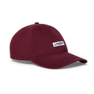 Angled view of the Lanzera Club Cap in Burgundy showing the curved brim and stitched Lanzera club patch on the front.