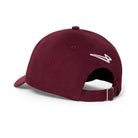 Back view of the Lanzera Club Cap in Burgundy with the embroidered Lanzera Flying Four logo above the adjustable strap.