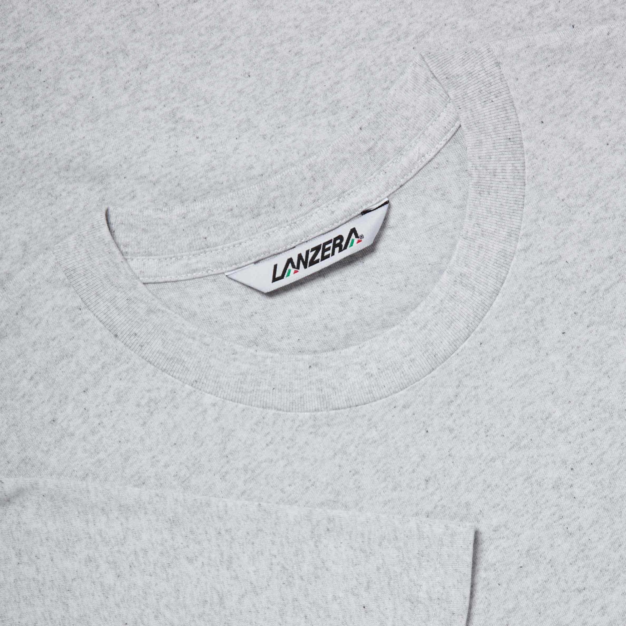 Detailed view of the Lanzera Club Tee in Heather, highlighting the ribbed neckline and inner label. The soft crew neck provides a comfortable fit, making it a versatile piece for everyday wear.