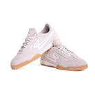 Pair of Lanzera Jackal Crema suede leather sneakers displayed together on a white background, highlighting the warm neutral color and minimal design.