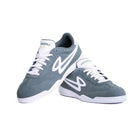 Pair of Lanzera Jackal sneakers in Sage green, positioned on a white background to display both lateral and frontal angles.