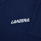 Close up of the Mondiale navy blue shirt with white 'Lanzera' logo.